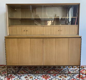 Paul McCobb Calvin The Irwin Collection Credenza: 2 pieces ; 60 1/2in T to top x 34 1/2in T to counter x 60in W x 19in at deepest 2 sliding glass doors at top & tri-fold doors on bottom section Doors and drawers all operate as they shouldLight wear