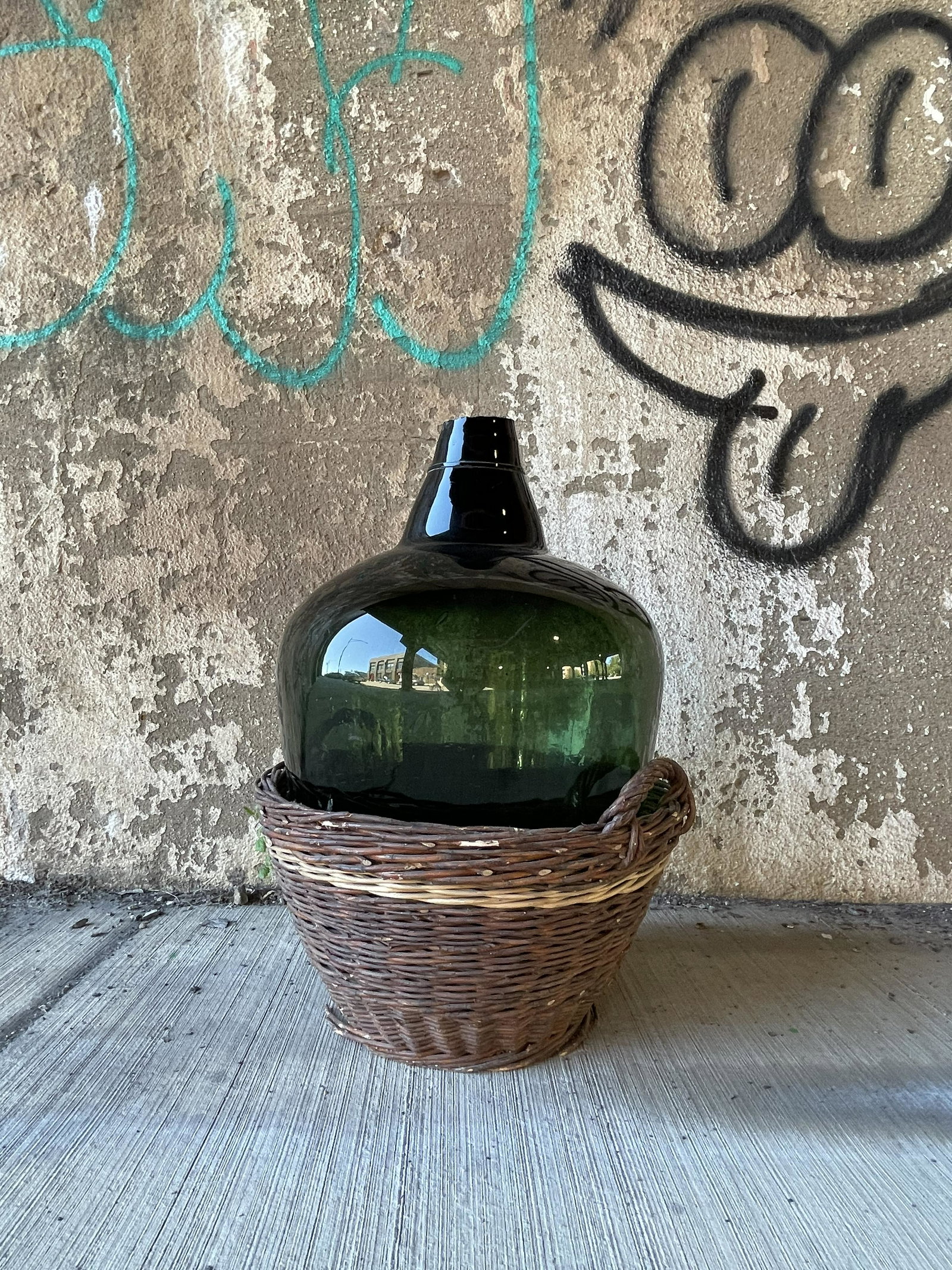 French Wine Demijohn in Wicker Basket: 25 in tall 19 in diameter