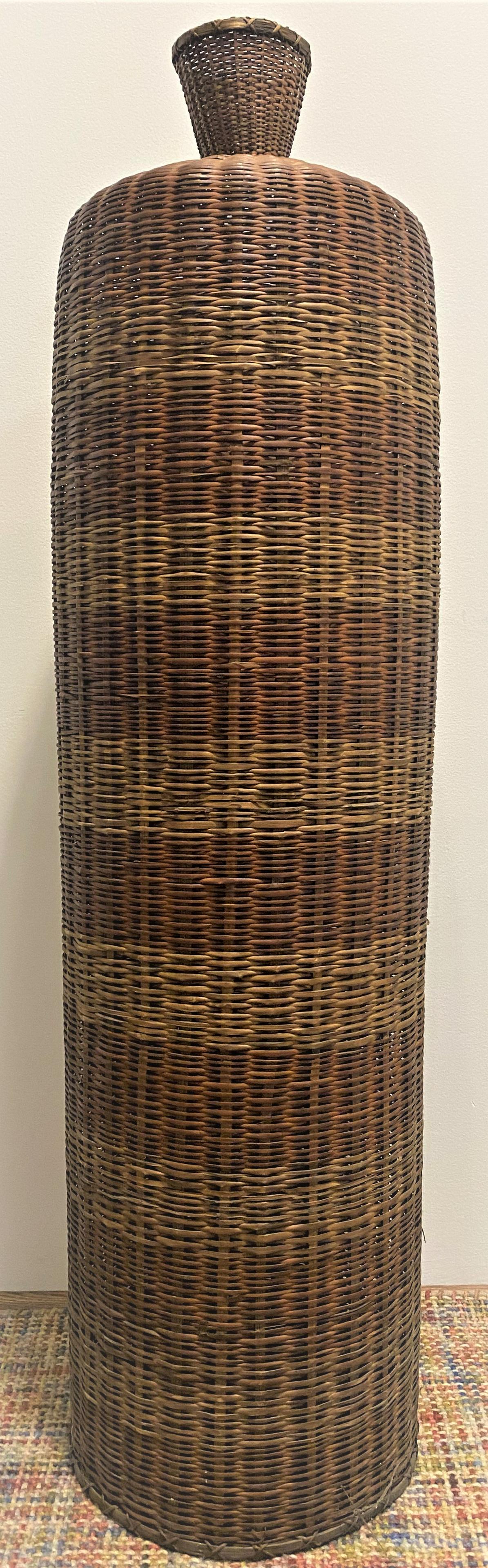 Tall Organic Wicker Rattan Vase: 53in T 14 1/2in base diameter x 5in diameter at top