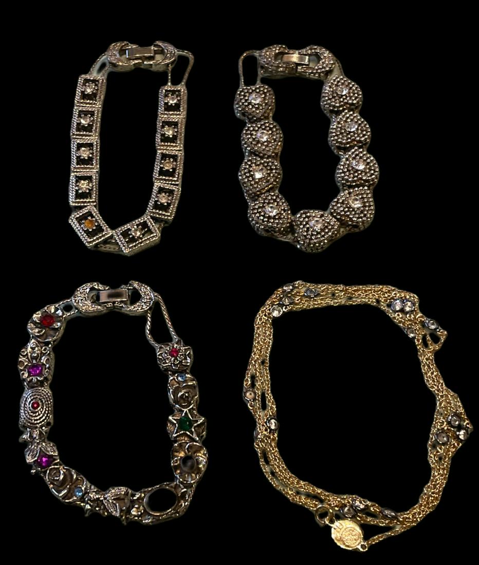 Three Victorian Style Slide Chain Bracelets and Sterling Necklace: sterling necklace weighs 6.9g, bracelets weigh 92.0 g, sterling necklace with clear stones measures 18 in long, bracelet with rectangular shape and clear stones measures 7.75 in long, bracelet with he
