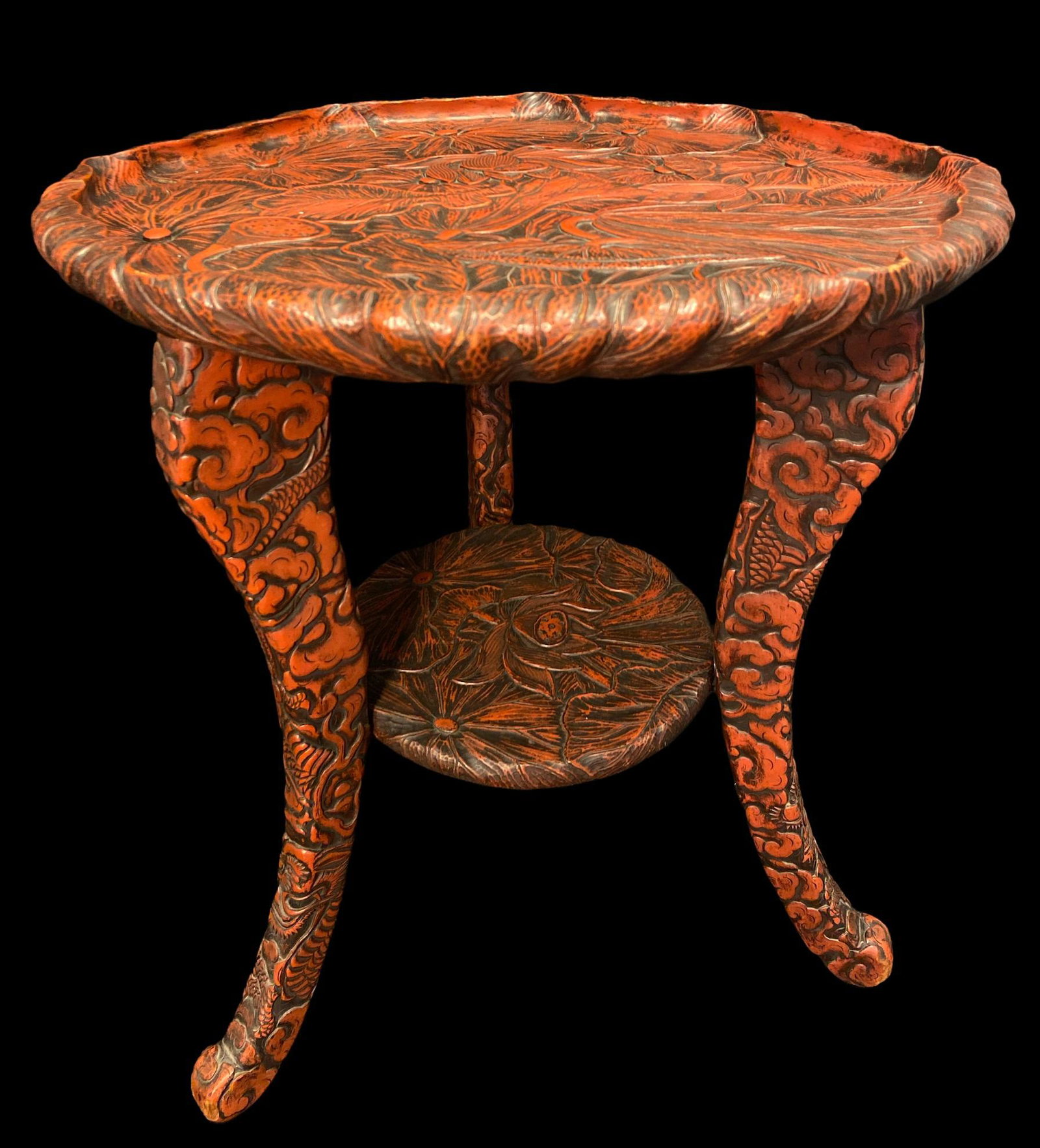 Carved Art Deco Floral Motif Table: 25in H x 22.5in dia
