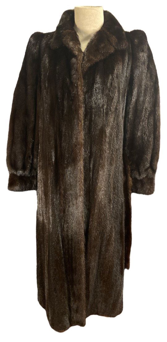 Vintage Women's Knee Length Mink Fur Coat: 45in L, 16.5in W shoulder to shoulder, 16.5in W armpit to armpit, sleeves measure 24in L. embroidered name on the right hand side. the sleeves are cinched at the wrist
