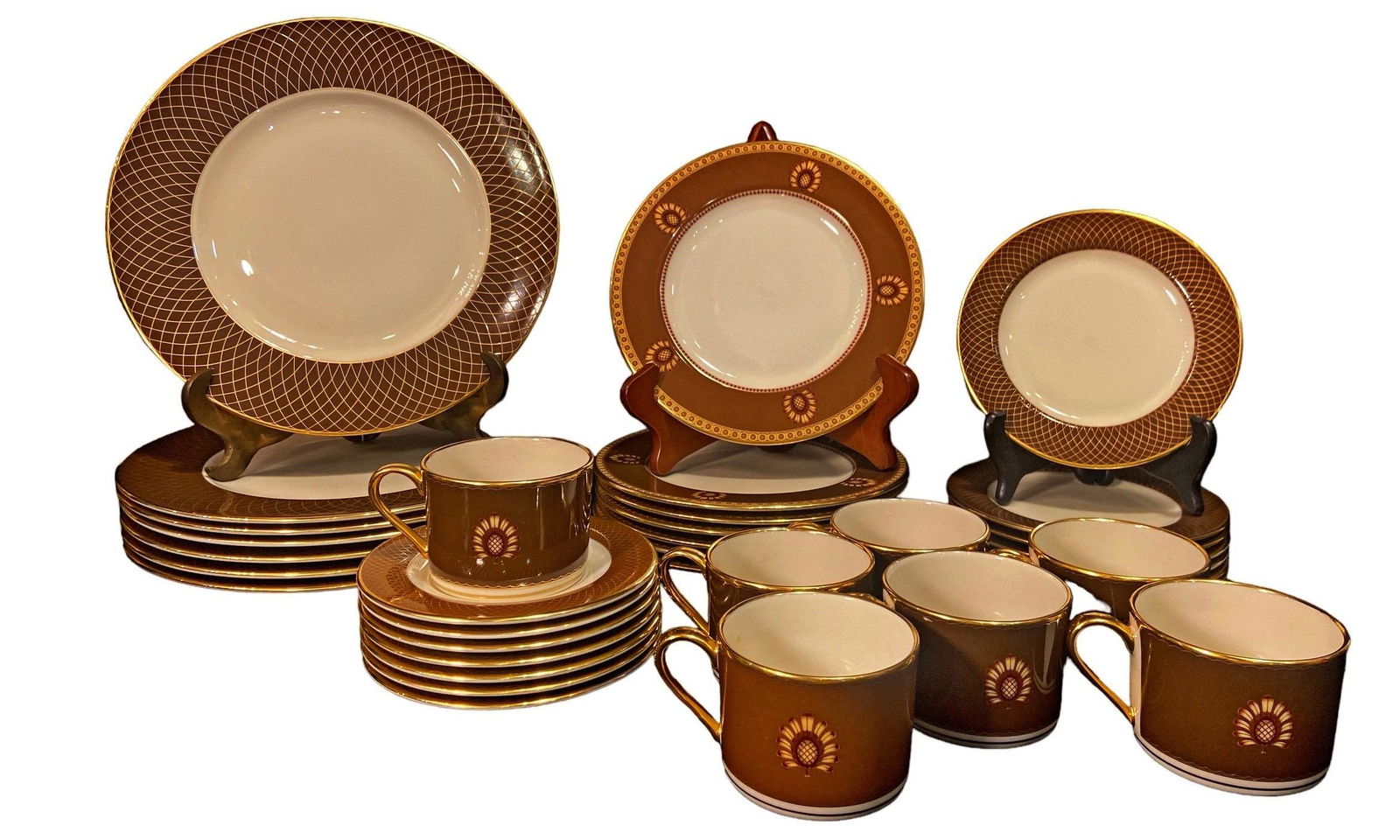 Au Courant Cocoa COLIN COWIE For LENOX China: Service for 7; 7 Dinner plates (11" DIA), 7 Salad plates (8" DIA), 7 Dessert Plates ( 6.25" DIA), 7 Coffee Cups and Saucer (Coffee Cup 2.5" H x 4.25" W including handle, Saucer 5.75" DIA),
