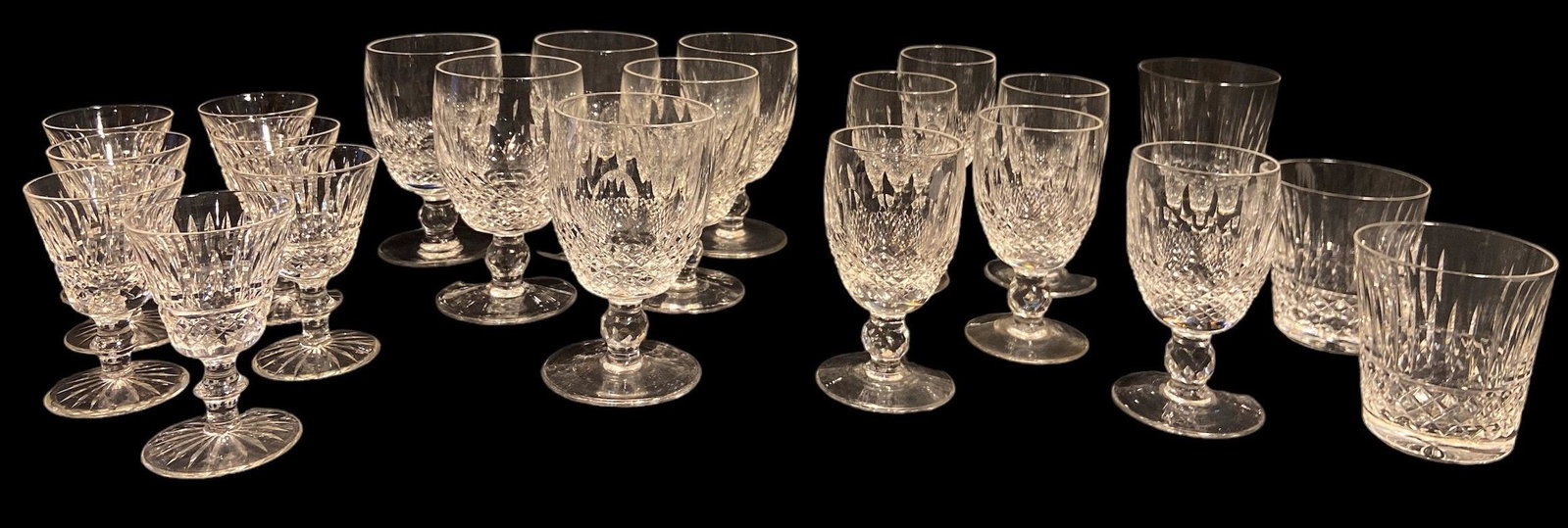 Collection WATERFORD Crystal Glassware Tramore, Colleen, Maeve: Includes 7 "Tramore" Port Wine Glasses measuring 4" H x 2.5" DIA , 6 Large "Colleen" Water Glasses (5.25" H x 3" DIA, 6 "Colleen" Wine Goblets (5" H x 2.5" DIA), 1 "Maeve" Highball Tumbler (5.25" H x 