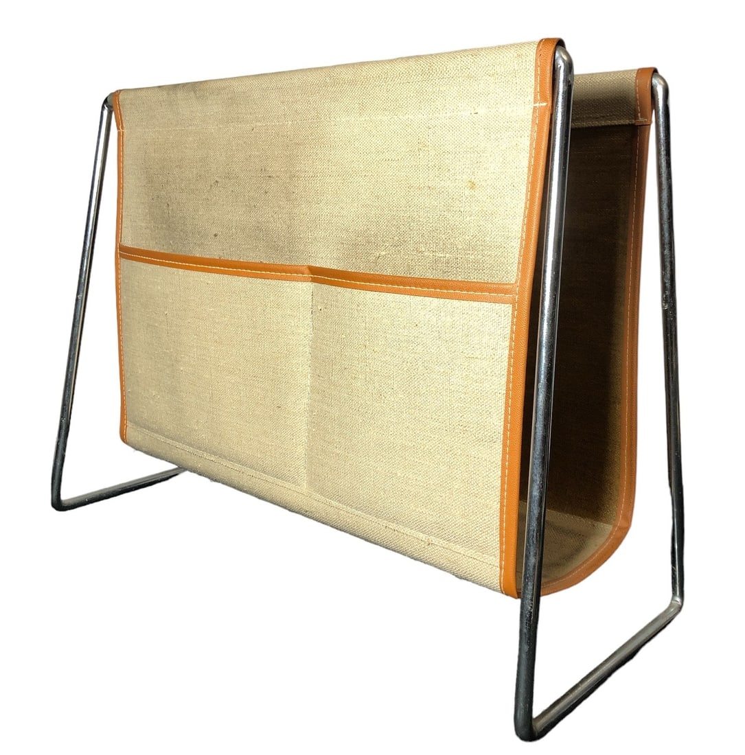 VERNER PANTON Bachelor Magazine Rack For FRITZ HANSEN: 15"H x 18"W x 8.25"D; Please contact Rivich Auction for more information.