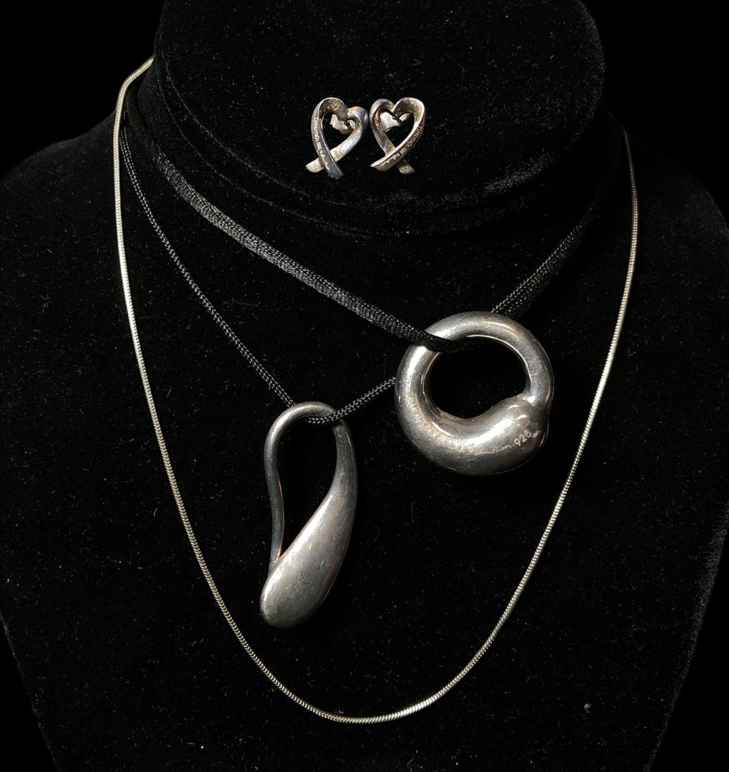 Collection TIFFANY & CO. Sterling Silver PALOMA PICASSO, ELSA PERETTI: Includes Paloma Picasso heart earrings, Elsa Peretti eternal circle pendants, and a sterling silver Tiffany & Co. chain.