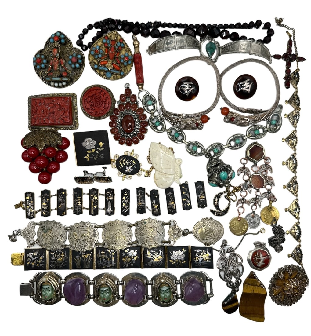 Collection Some Sterling Silver, Asian, Egyptian Jewelry: Includes Siam sterling, carved bone, turquoise, amethyst, and more. All pieces are assorted sizes and include necklaces, bracelets, pendants, etc. 19oz.