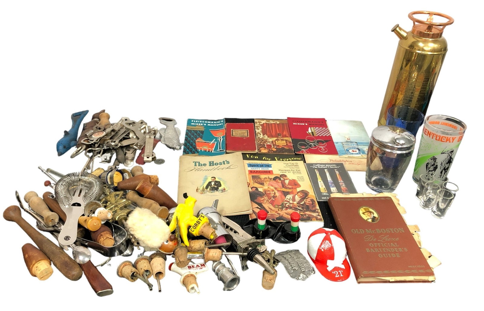 Large Collection of Vintage Barware & Accessories: Largest piece measures 11.25"H x 4.5" W x 3.75" D; Includes various Mixing guide books, glasses, bottle openers, wine stoppers,etc.