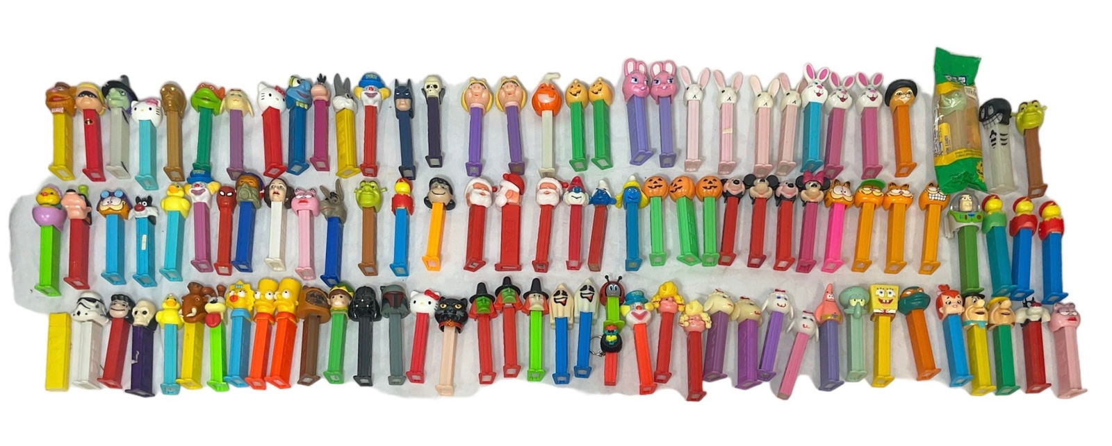 Collection 100+ Pcs. Vintage Pez Dispensers: Includes Mickey Mouse, Sesame Street, Batman, Smurfs, Shrek, Flintstones, Hello Kitty, Garfield, Simpsons, Christmas, Easter, Halloween, Toy Story, and more.