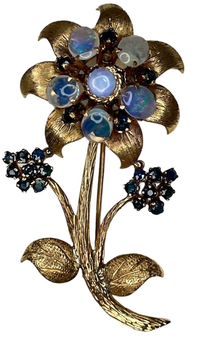 Floral Gold, Moonstone, and Sapphire Brooch: 2.5" H x 1.5" W. Marked 18k but tests for 10k gold, 6.73dwt.