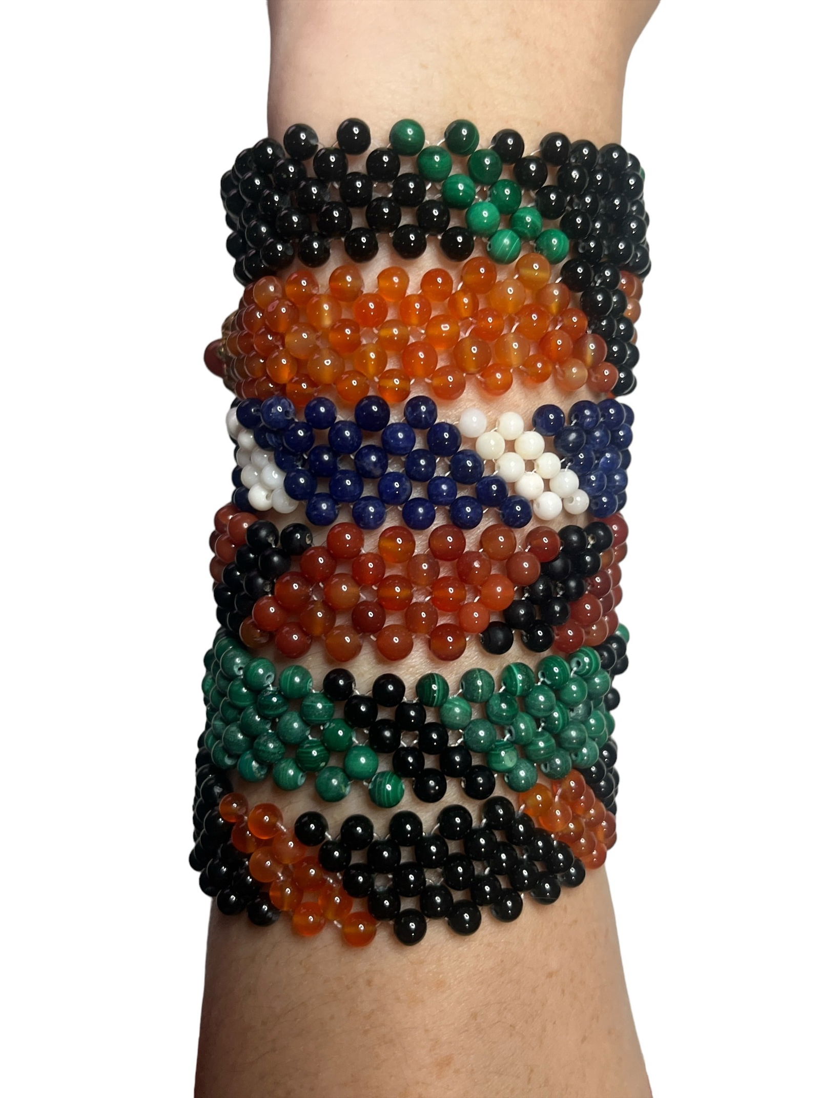 Collection Vintage Semi Precious Stone Bracelets: Includes sodalite, onyx, malachite, white coral, carnelian, and orange agate. All bracelets have 6" total length.