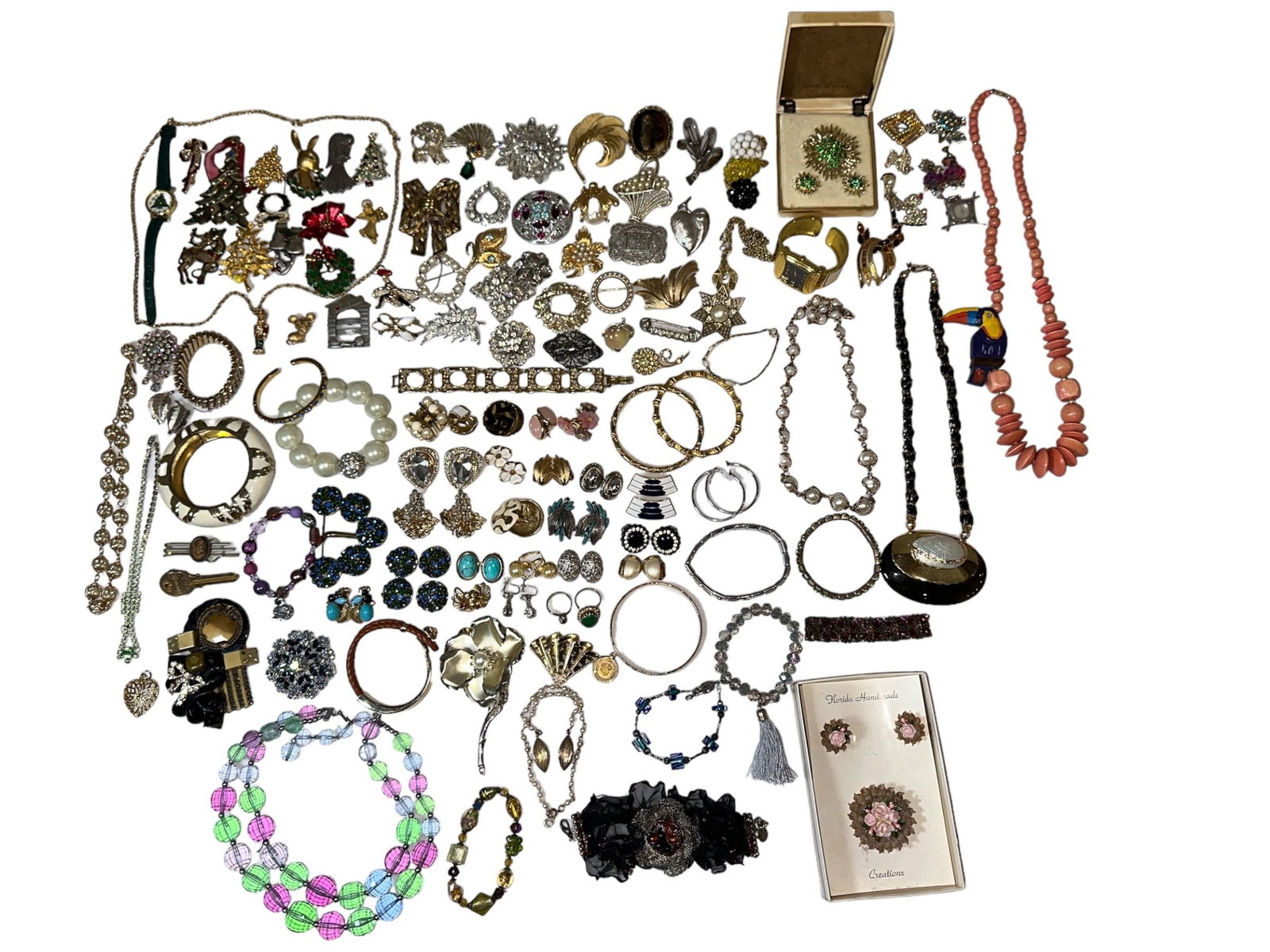 Large Collection Costume Jewelry, TRIFARI: Includes an assortment of necklaces, bracelets, rings, and more.