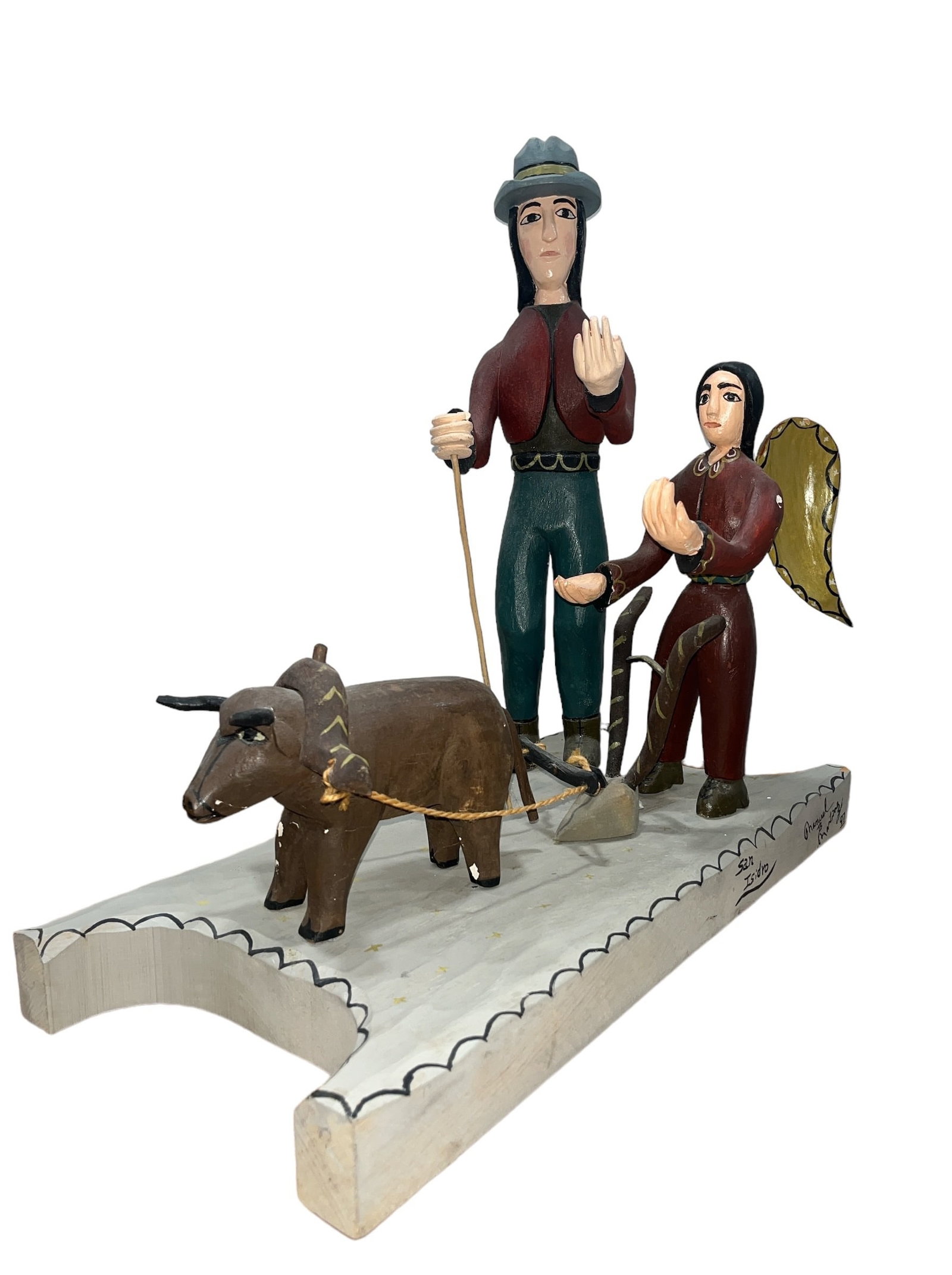 MANUEL B MARTINEZ "San Isidro" Folk Art Sculpture: 19.5" H x 9.25" W x 20.5" D. Signed, titled, and dated 1997.