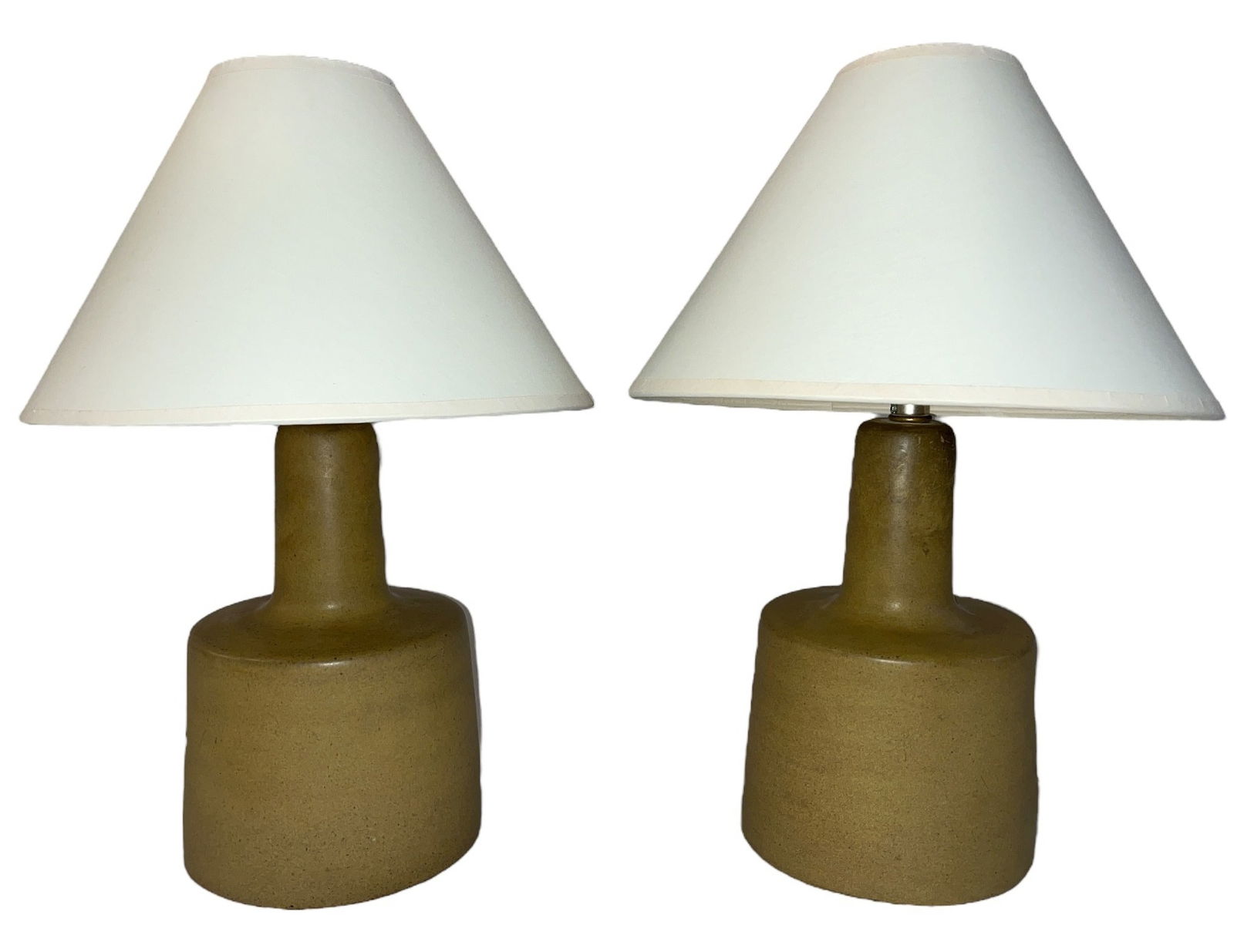 JANE & GORDON MARTZ Table Lamps, Pair: Pair of Lamps Marshall Studios, USA glazed stoneware, fabric shadeEach stamped signature MartzEach measures 12" H to socket x 6.25" DIA overallshade measures 11" DIA.