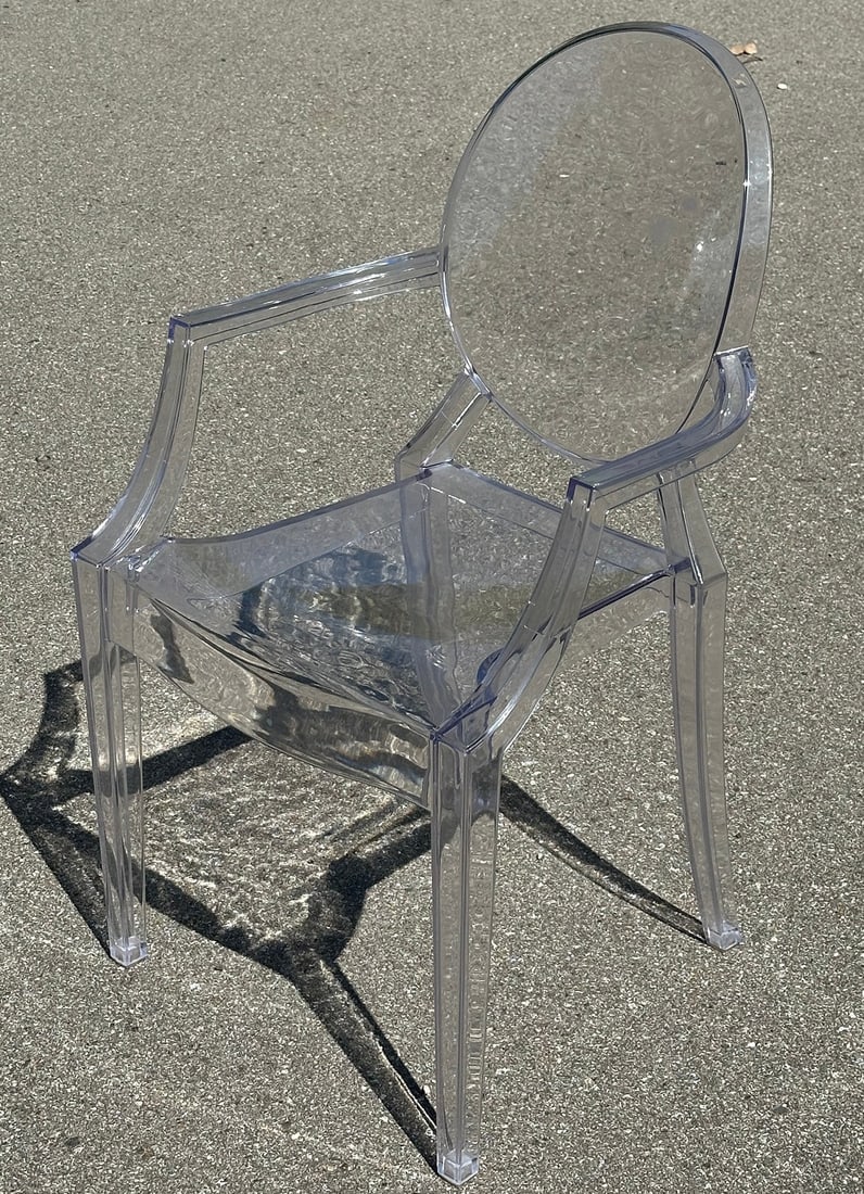 After PHILIPPE STARCK Ghost Chair: 36.5" H to the back, 18" H to the seat, 21" W x 19" D.