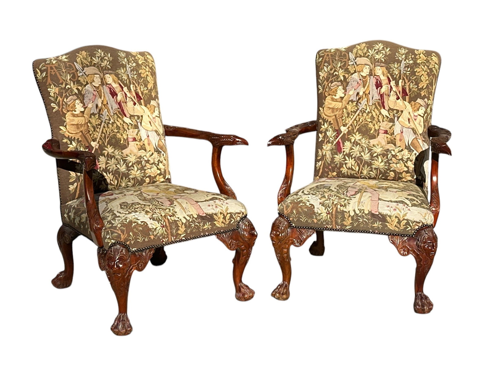 Pair of George III Style Mahogany Armchairs: 43.5" H to the back, 20" H to the seat x 31.5" W x 30" D. Includes ornate face and talon carvings.