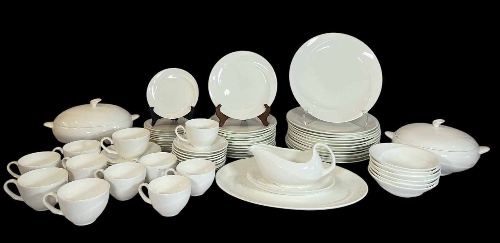 A Set of WEDGWOOD "Shape 225" Bone China Dinnerware, 70pcs.: 12 dinner plates measuring 10.75", 12 salad plates measuring 8" DIA, 11 dessert plates measuring 6.25" DIA, 2 vegetable dishes with lids measuring 5" H x 10.5" W x 8" D, 6 bowls measuring 2" H x 6.25"