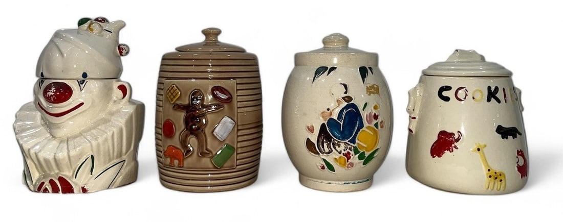Four Vintage MCCOY Pottery Circus Cookie Jars: The gingerbread man jar is 9.75" H x 6.5" DIA and is marked USA on the bottom, the clown is 10.5" H x 8" W x 7.5" D and is marked Mccoy on the bottom, the animal cookie jar is marked USA on the bottom
