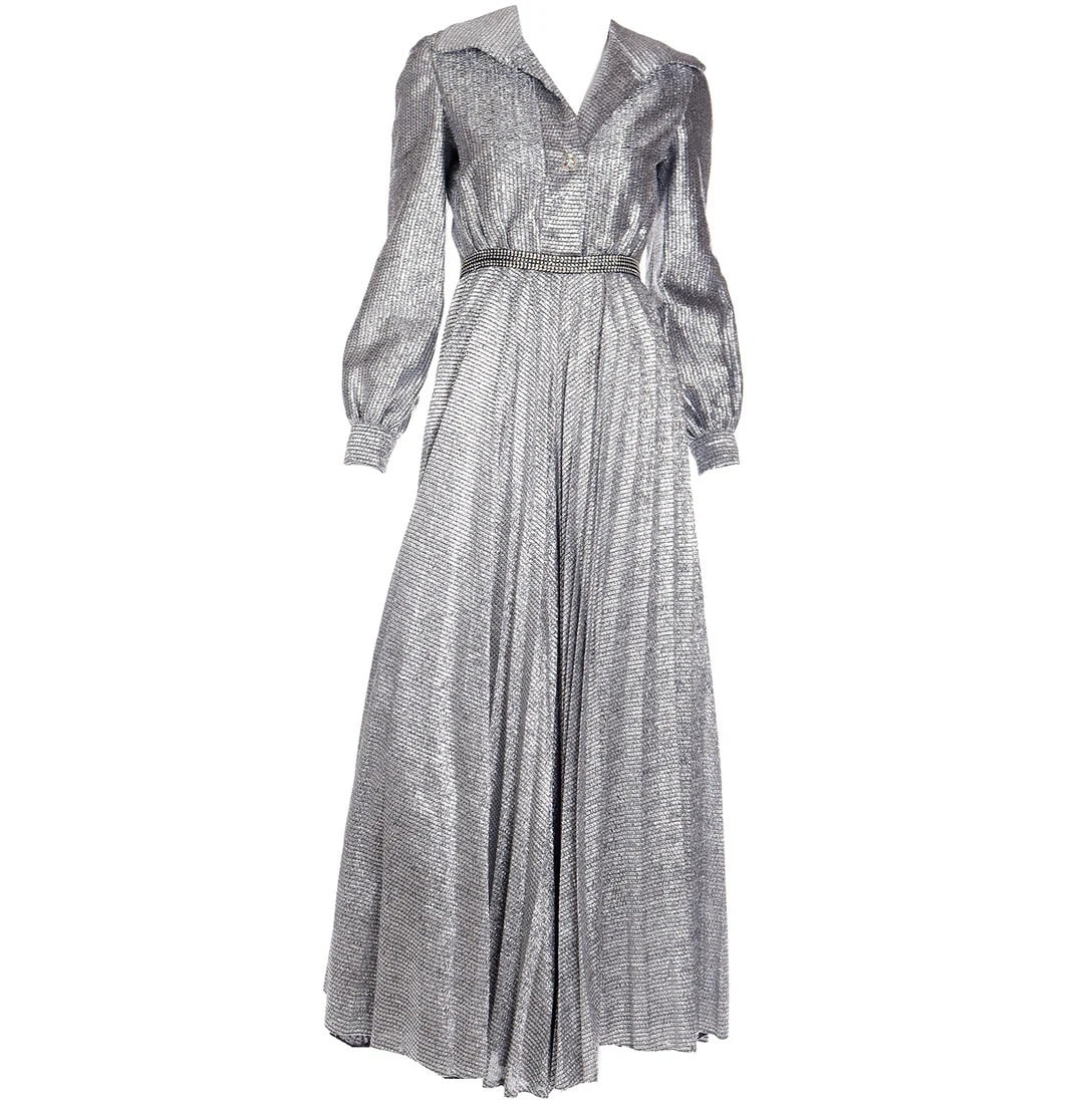 A Gorgeous 1970s Silver Lurex Wide Leg Jumpsuit: Measures 36" at the bust, 26" at the waist, 24" sleeve length, 56" total length.
