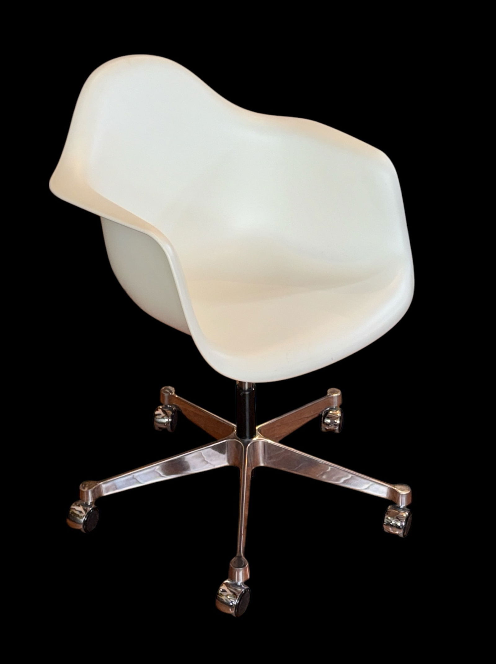 EAMES for HERMAN MILLER Task Chair: Vitra, Charles & Ray Eames. Molded Plastic. 33" H to backx 18" H to seat x 24" W x 24" D.
