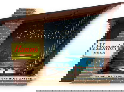 A 1960s HAMMS Beer Night Sky Advertisement Sign: Measures 16" H x 21.5" W x 4" D. Features a night sky with stars lighting up to read "Hamms" and show beer glasses. Reads "From The Land of Blue Sky Waters" across the bottom. Can sit on a table top o