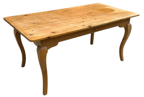 A Scandinavian Pine Dining Table: Measures 30" H x 66" W x 35" D.