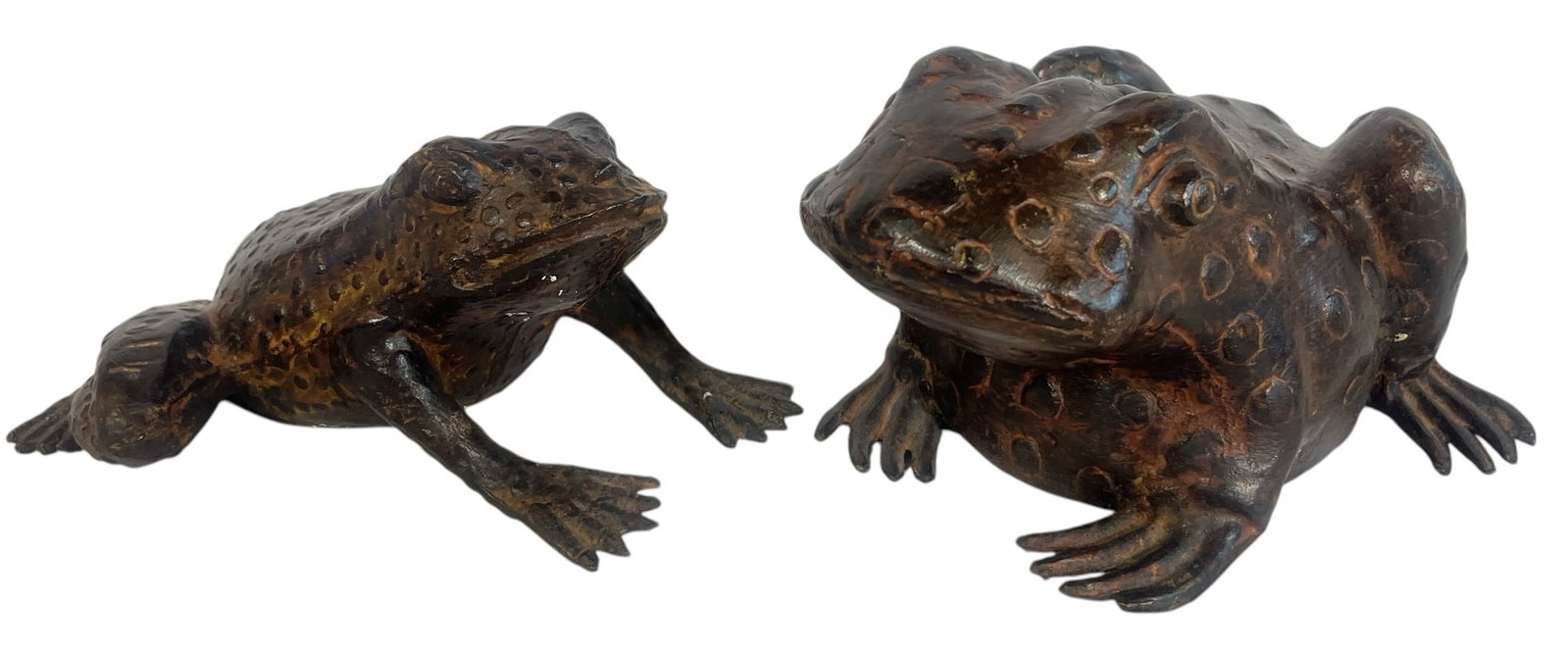 Two Cast Metal Toad Garden Ornaments: Larger toad measures 4" H x 7" W x 9" D. The smaller is 3.5" H x 7" W x 7.5" D.