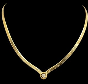 A 14k Gold and Diamond Necklace