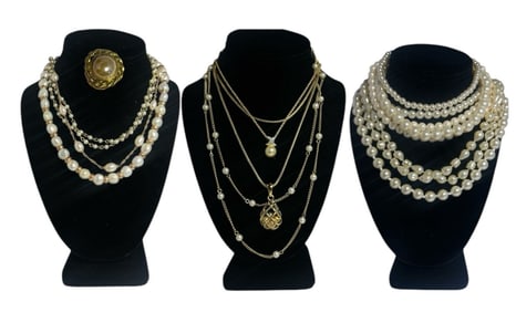 A Large Collection of Pearl and Gold Tone Necklaces and Scarf Clip