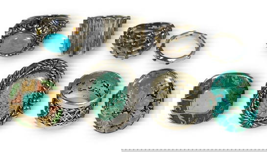 An Assortment of Sterling Silver, Turquoise, and Gemstone Rings: Lot weighs 67.83 grams. Includes ring sizes 7 and 8, the thin band is a size 6. Includes turquoise, peridot, citrine, and other gemstones. See photos for all included pieces.