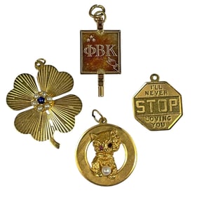 An Assortment of Gold Charms, 14k & 10k Gold