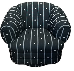 A Mid Century MILO BAUGHMAN Style Swivel Armchair