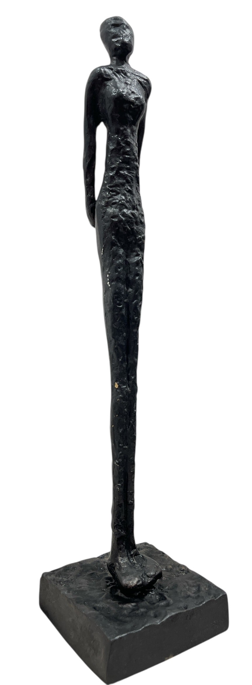GIACOMETTI Style Standing Woman Sculpture: 15.25" H x 3.75" W x 3.75" D at the base. Made of a composite material.