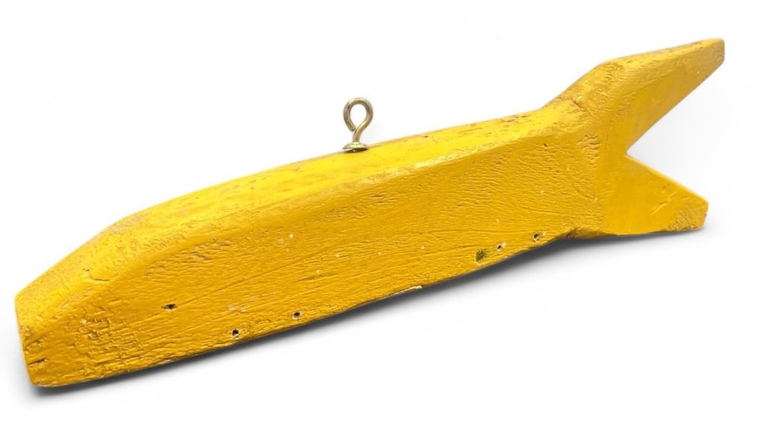 A Primitive Folk Art Fishing Lure: Measures 5" H x 16" W x 2.25" D.