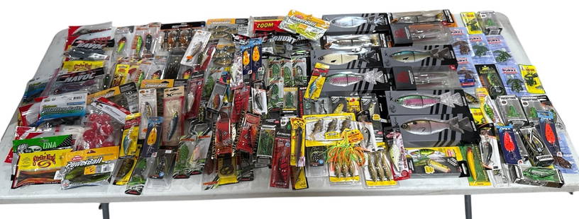 100+ Pcs NOS Fishing Lures, Bait, & Accessories: Includes pocket frog lures, swim bait, Berkeley, Matzuo, Lunkerhunt, Apex, etc lures. Largest is the swimbait in box and measures 11" H x 4" W x 1.5" D in box.