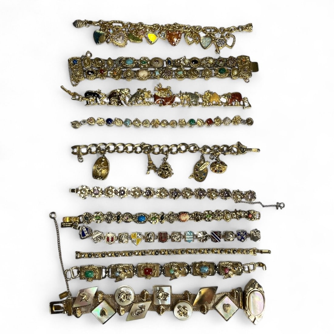 A Collection of Slide Chain Bracelets, KIRKS FOLLY: All bracelets are approx. 7-8" DIA.