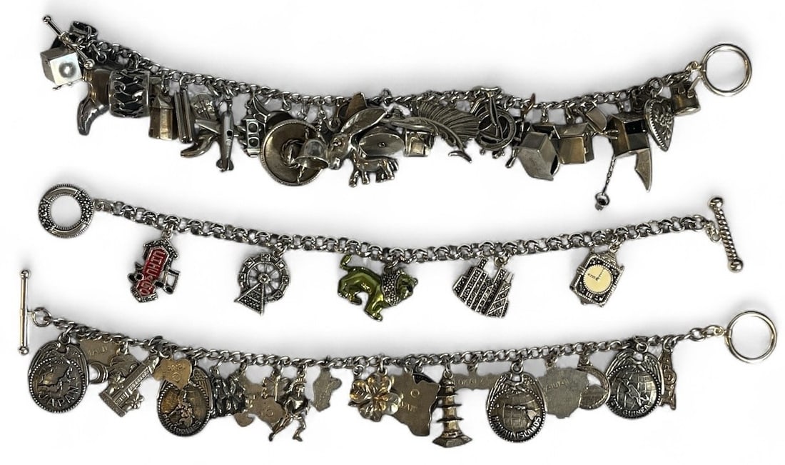 Three Sterling Silver Charm Bracelets: All measure approx 7.5" long. Lot weighs 4.41ozt.