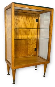 A Mid Century Standing Vitrine Showcase