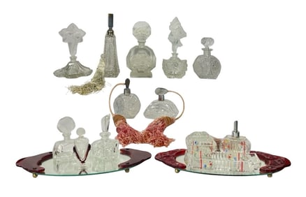 A Collection of 1920s-1950s Perfume Bottles and Trays
