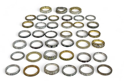 A Collection of Sterling Silver and Costume Jewelry Eternity Bands