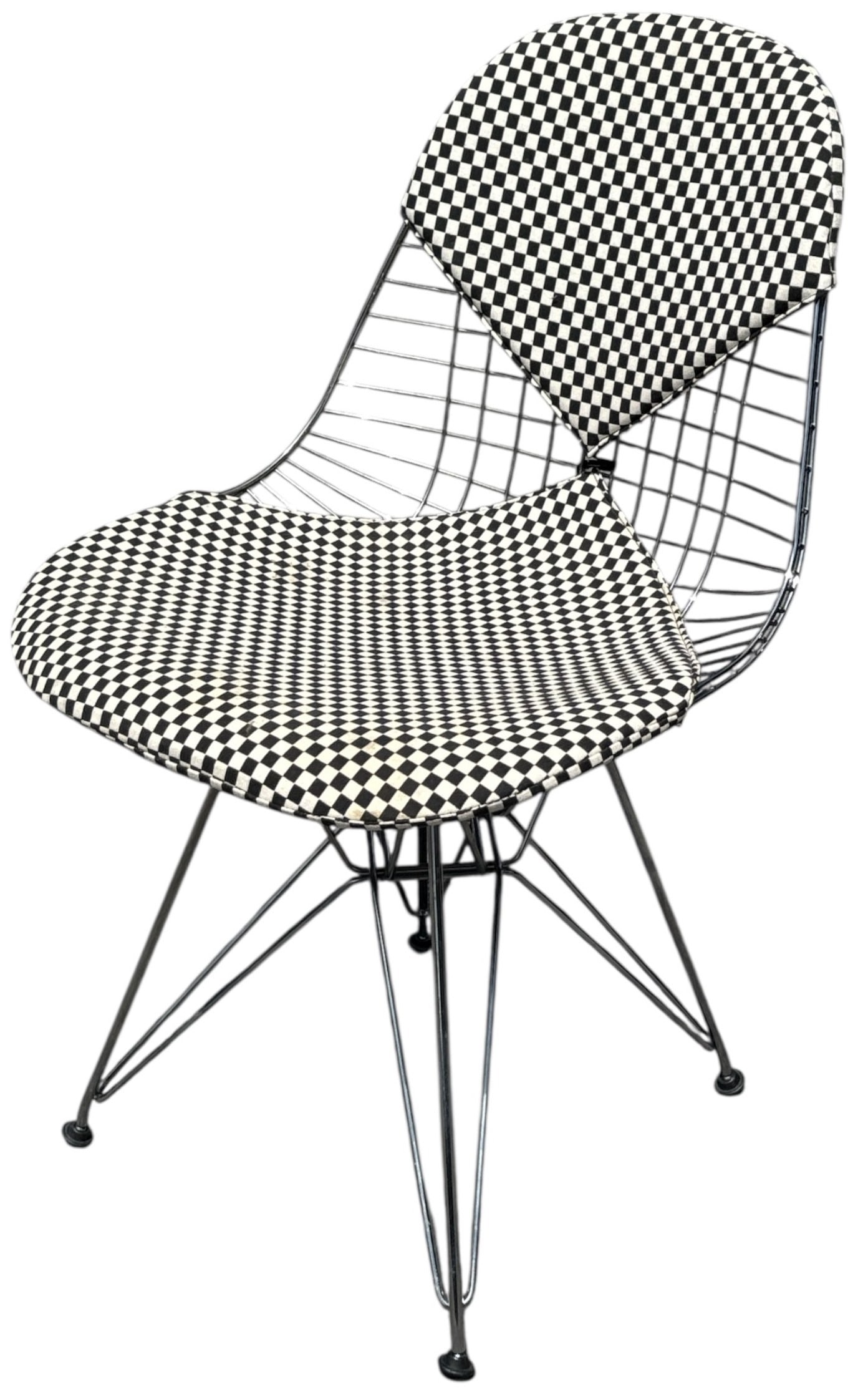 CHARLES & RAY EAMES "Bikini" Chair, HERMAN MILLER: 31.5" H to back x 18" H to seat x 19" W x 19" D.