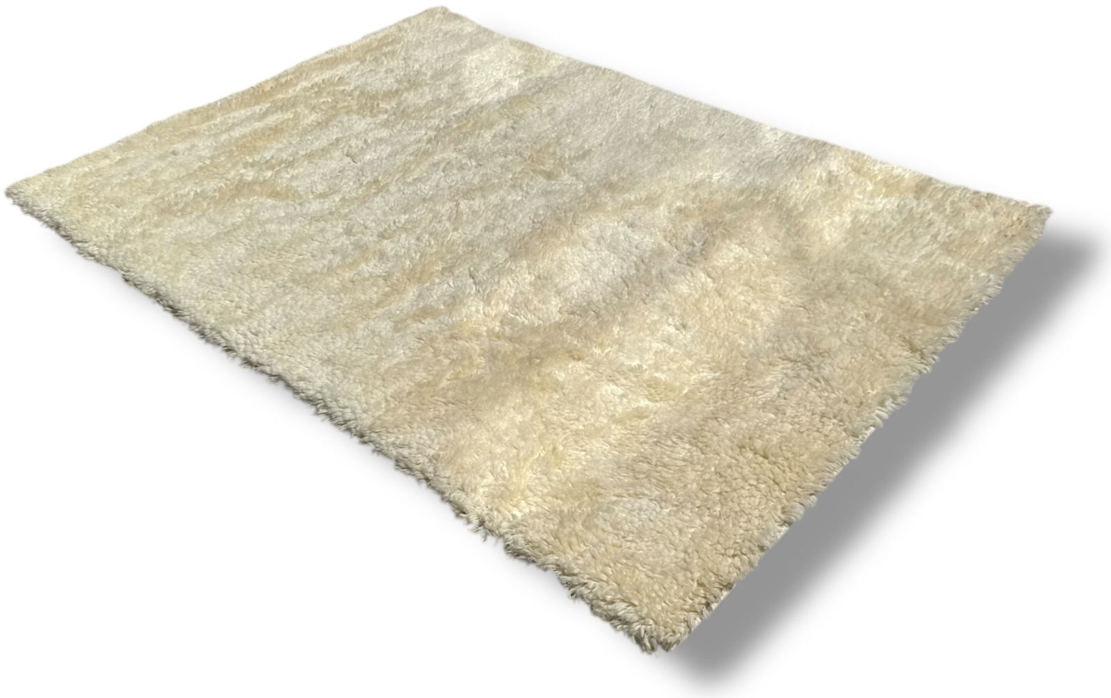 A Large HAY "Shaggy Rug" Wool Rug: 5.5' x 8'. 96" x 65.5