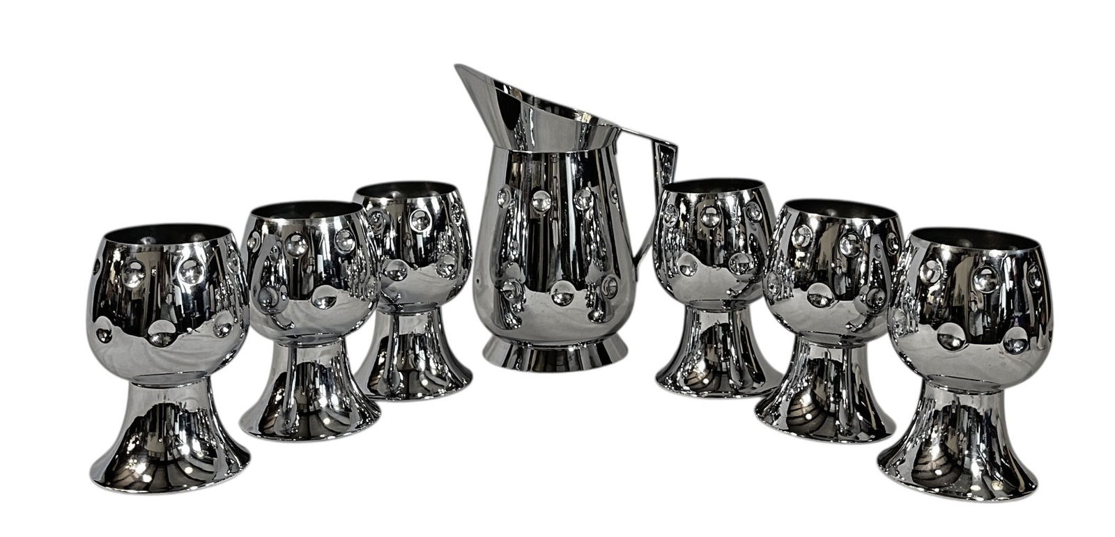 Set of Six CHASE Chrome Water Goblets & Pitcher: Pitcher measures 9.75" H x 7.5" spout to handle, overall DIA 5.5". The cups each measure 6.25" H x 4" overall DIA, 3.25" opening at top.