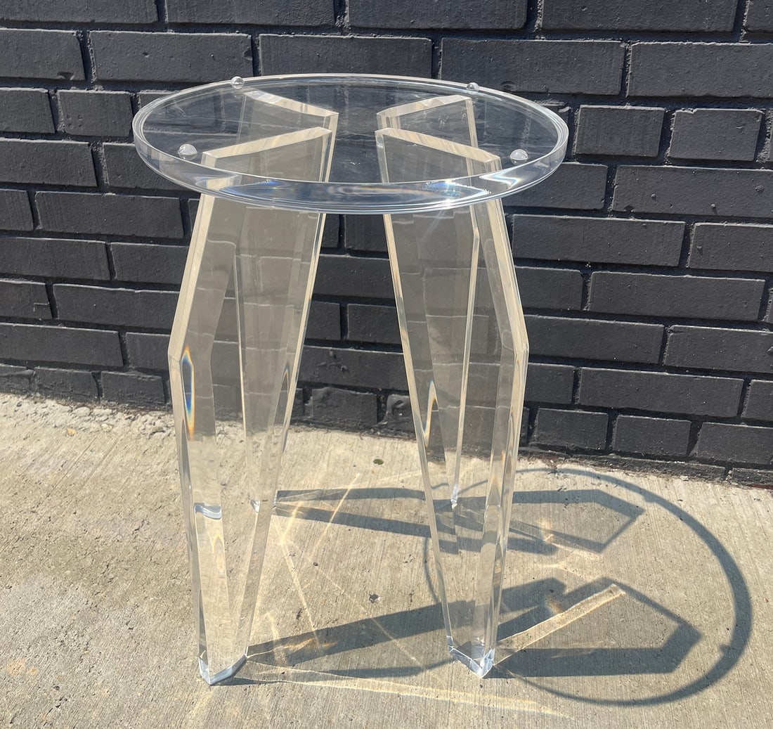 A Postmodern MUNIZ Lucite Accent Table: Measures 20.75" H x 14.5" DIA at top.