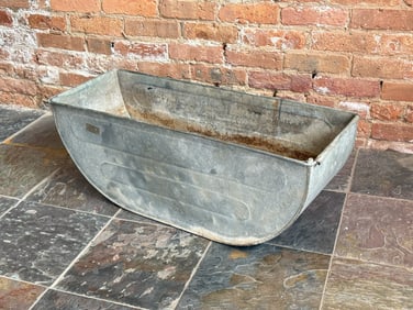 A Vintage Gas Station Tire Washing Tub