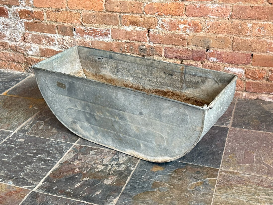 A Vintage Gas Station Tire Washing Tub: 12" H x 32" W x 11.2" D.