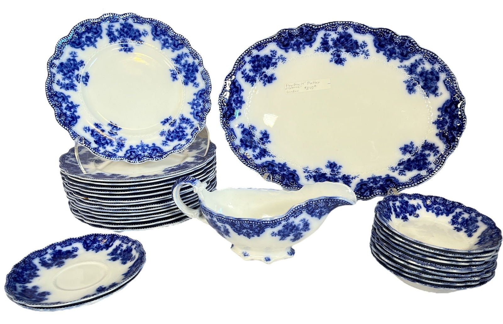 Collection of 19th C. GRINDLEY "Osborne" Flow Blue Dishware: A partial set of Grindley "Osborne" Flow Blue dishware. Includes 15 dinner plates measures 9" DIA. Platter measures 1.5" H 14.25" W 10.5" D. Gravy bowl measures 4" H x 3.5" W x 9" D. 10 small bowls 1"