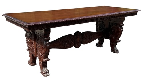 A Henry II Style Carved Lion Foot Library Table