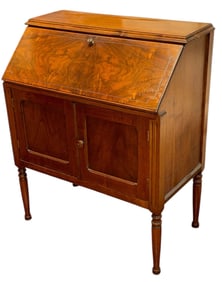 An Antique Flamed Mahogany Secretary Desk