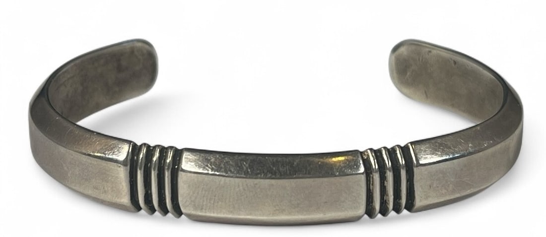 A CIPPY CRAZYHORSE Native American Sterling Silver Cuff Bracelet: A heavy sterling silver Native American Cippy CrazyHorse cuff bracelet. Measures 2.75" x 2" and weighs 22.43dwt.